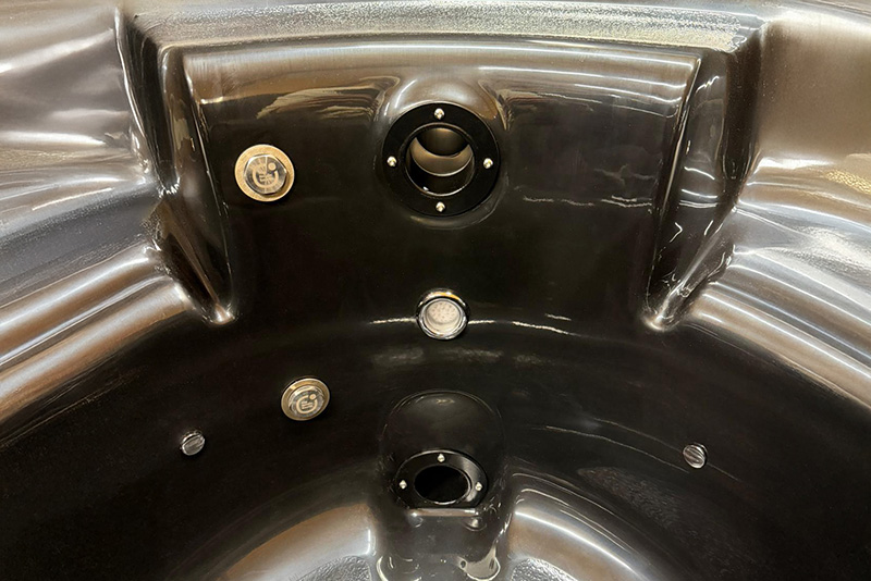 Patent-pending LV-RV stainless steel hose fitting for hot tubs and ice baths — complete component set with sealing gasket, clamping nut, washers, and closure caps